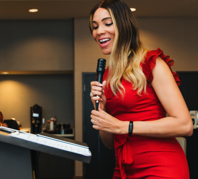 Moni speaking to women during a friendship coaching event